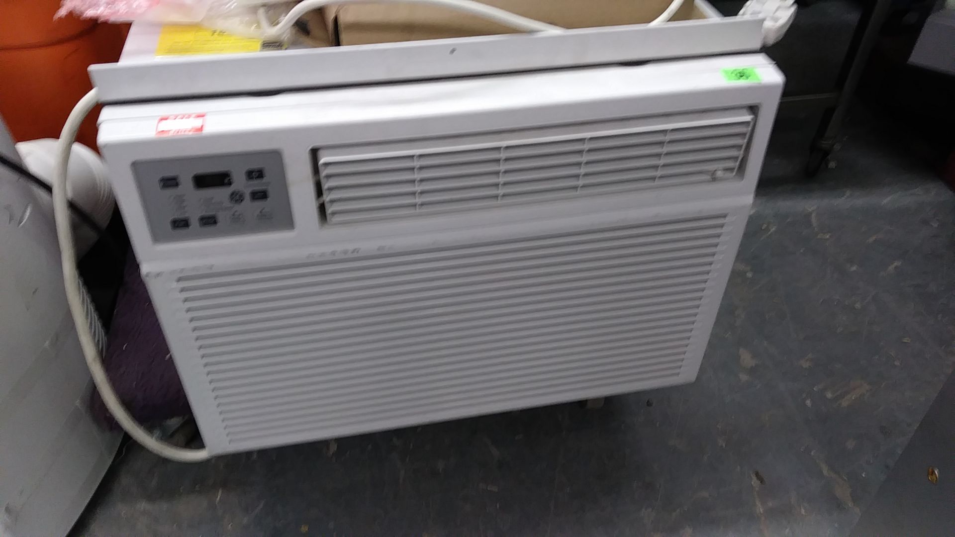 GE WINDOW AIR CONDITIONER (AEH24DXL1) (APPROX 26" W x 25" H x 26" D)