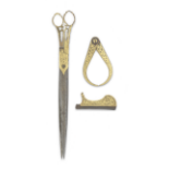 A pair of Ottoman gold-damascened steel Calligrapher's scissors and two other tools Turkey, 18th/...