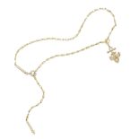 a gold and diamond lariat necklace