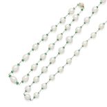 A pair of cultured pearl and emerald necklaces