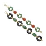 A chrysoprase and carnelian bracelet along with an onyx and chrysoprase bracelet