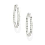 A pair of diamond and emerald hoop earrings
