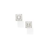 A pair of diamond stud earrings