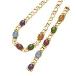 A colored stone necklace and bracelet set