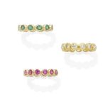 A group of three gem-set and diamond eternity bands