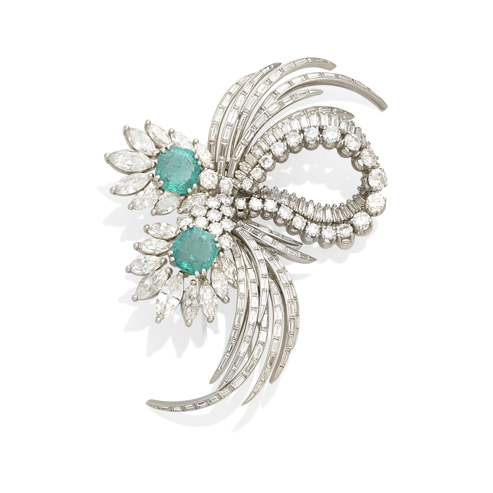 An emerald and diamond spray brooch