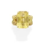 A checkerboard-cut citrine ring