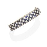 A sapphire and diamond bangle