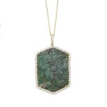 A carved emerald and diamond pendant
