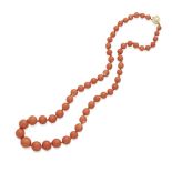 A graduated coral bead necklace