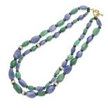 A sapphire and emerald bead necklace