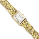 A gilt 'tank' wristwatch, Cartier