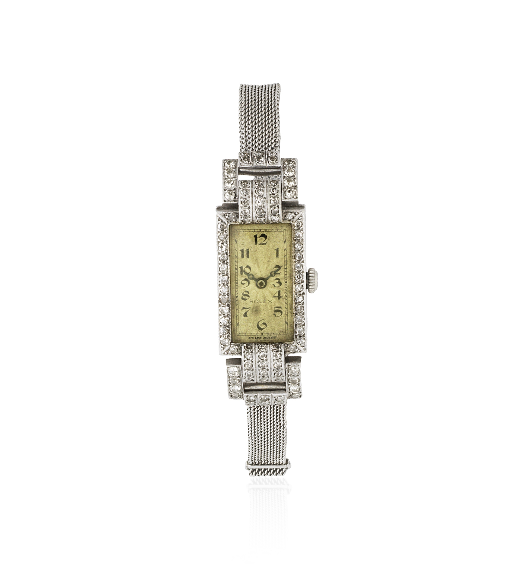 Rolex. A lady's 18K white gold and diamond set manual wind cocktail watch Glasgow Import mark for...