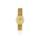 Omega. A lady's 18K gold and diamond set quartz bracelet watch Ref: 1450, Circa 1984