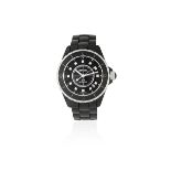 Chanel. A black ceramic automatic calendar bracelet watch with roulette back and diamond set dial...