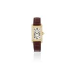 Cartier. A lady's 18K gold and diamond set quartz rectangular wristwatch with new Cartier alligat...