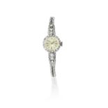 Jaeger-LeCoultre. A lady's 18K white gold and diamond set manual wind cocktail bracelet watch Cir...