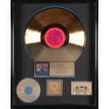 A JERRY GARCIA 'GOLD' SALES AWARD FOR THE BOB DYLAN / GRATEFUL DEAD ALBUM DYLAN & THE DEAD 1989