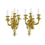 A pair of Napoleon III gilt bronze five light Sconces Third quarter 19th century