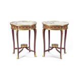 A Pair of Louis XVI Style Marble top gilt bronze mounted Mahogany Tables