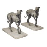 A pair of continental lead figures of greyhounds 20th Century