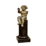 An Italian Baroque Figure of a Putto on a Painted Pedestal 18th century and later