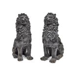 A pair of Renaissance style black painted cast iron lions guardants, First half 20th century