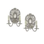 A pair of Baroque Style Silvered metal two-light wall sconces