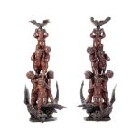A Pair of Venetian Style Carved Walnut Figural Columns