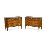 A Pair of Transitional Louis XV/XVI Marble Top Gilt Bronze Mounted Kingwood and Tulipwood Commode...