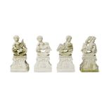 A set of four carved Vicenza stone figures of putti depicting the Four seasons 20th century
