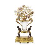 A French Style Patinated and Gilt Bronze, Porcelain and Engraved Glass Centerpiece