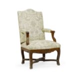 A Louis XV walnut fauteuil a la reine First quarter 18th century