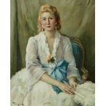 Fernand Toussaint (Belgian, 1873-1955) A portrait of a seated lady in a white dress with a blue ...