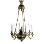 A Charles X style gilt bronze and blue enamel six light chandelier