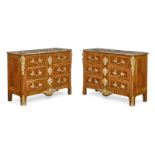 A Pair of Regence style Marble Top Gilt Bronze Mounted Kingwood and Mahogany Commodes 20th Century