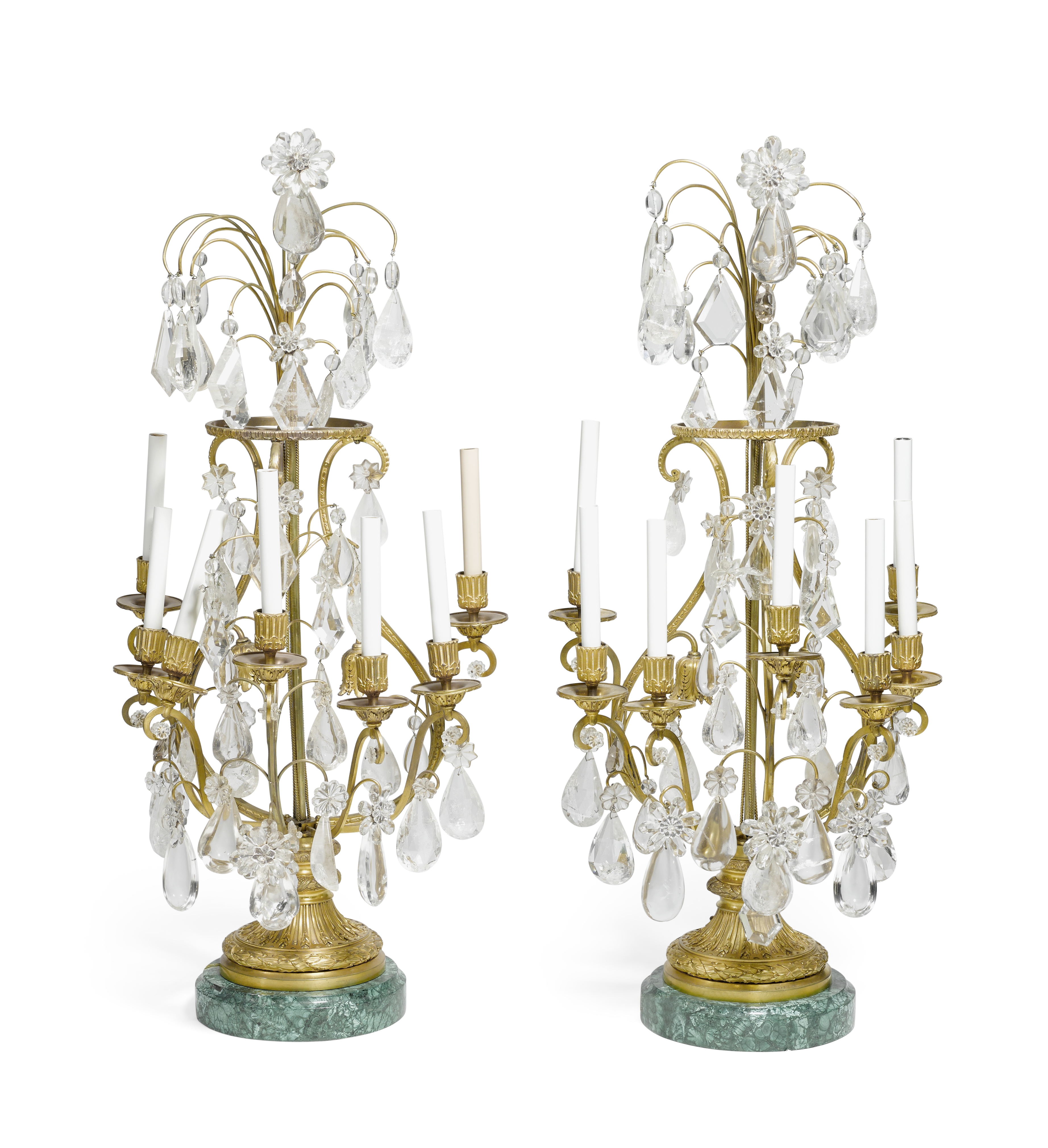 A pair of Louis XVI style gilt bronze, rock crystal and malachite veneered seven light girandoles