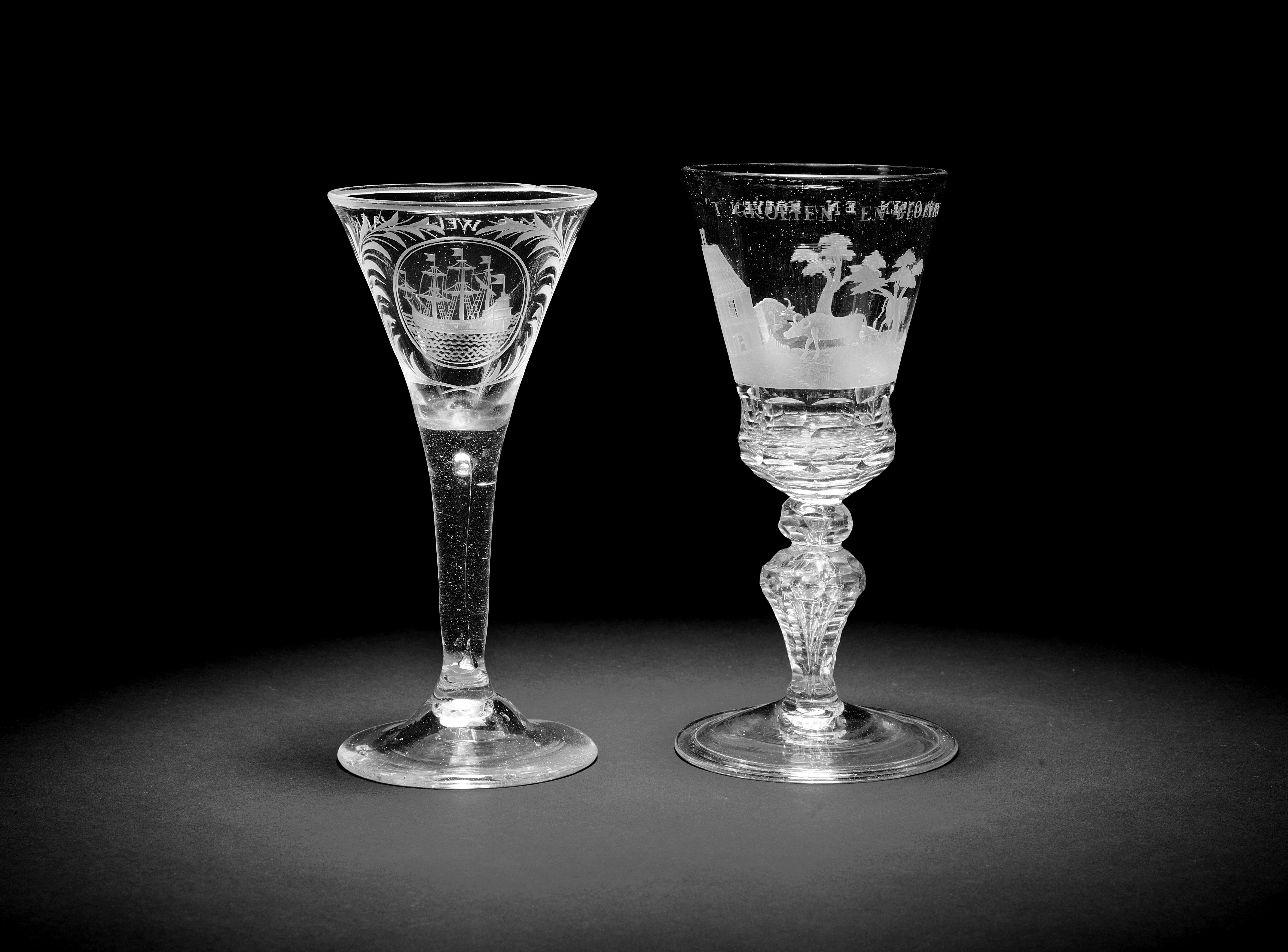 A Dutch engraved Saxon glass goblet and a wine glass, second quarter 18th century