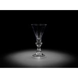 A heavy baluster large wine glass or goblet, circa 1710-20