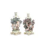 A pair of Chelsea fable candlesticks, circa 1765-70