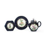 A Worcester teapot, cover and stand and a matching saucer dish, circa 1770