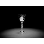 A Dutch engraved light baluster wine glass, circa 1760