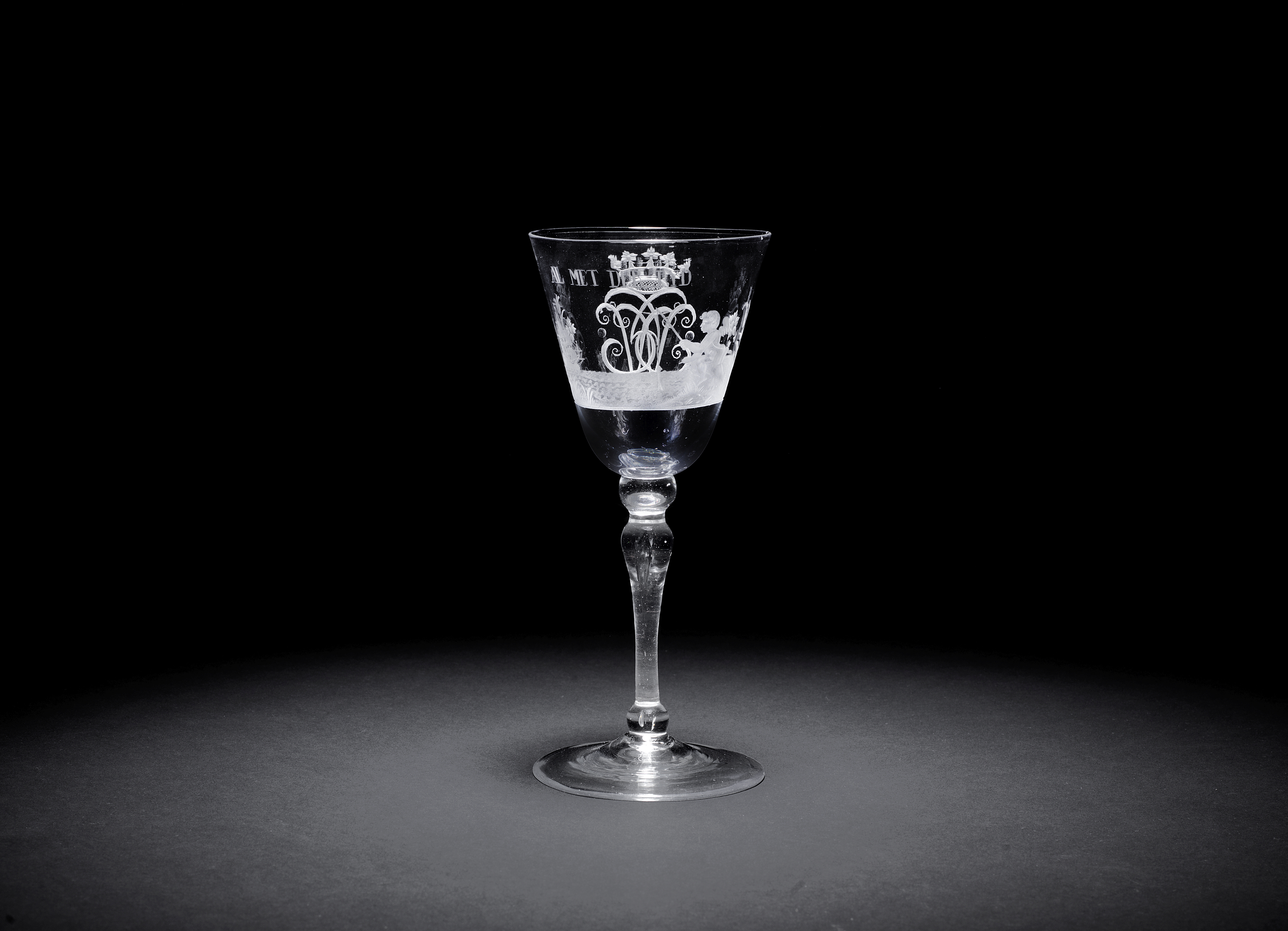 A Dutch engraved light baluster wine goblet, circa 1760