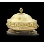 A French silver-gilt serving dish and cover with gilt copper warming stand from the Borghese Serv...