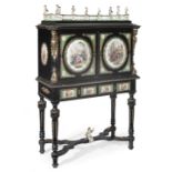 A pair of German 19th century porcelain and gilt bronze mounted ebonised cabinets on stands (2)