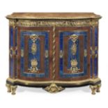 A gilt bronze, silvered metal, aventurine glass and blue coloured glass mounted ebony and ebonise...