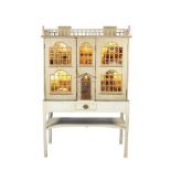 A late 18th century English painted pine baby house in the Palladian style with later contents an...