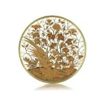 A late 19th century gilt brass mounted ivory and marquetry inlaid circular wall plaque by Maison ...