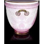 Attributed to Baccarat: A pair of pink overlay cameo glass wine coolers in the neo-grec style cir...