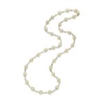 A cultured pearl, diamond and gold necklace, by Charles de Temple,